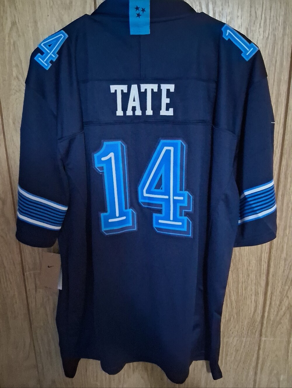 Mystery Sports Card With Carnell Tate Tennessee Titans Fuse Rivalry XL Jersey